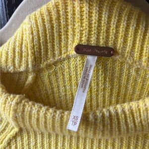 Lightly worn yellow free people sweater